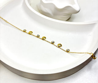 The Golden Seashell Charm