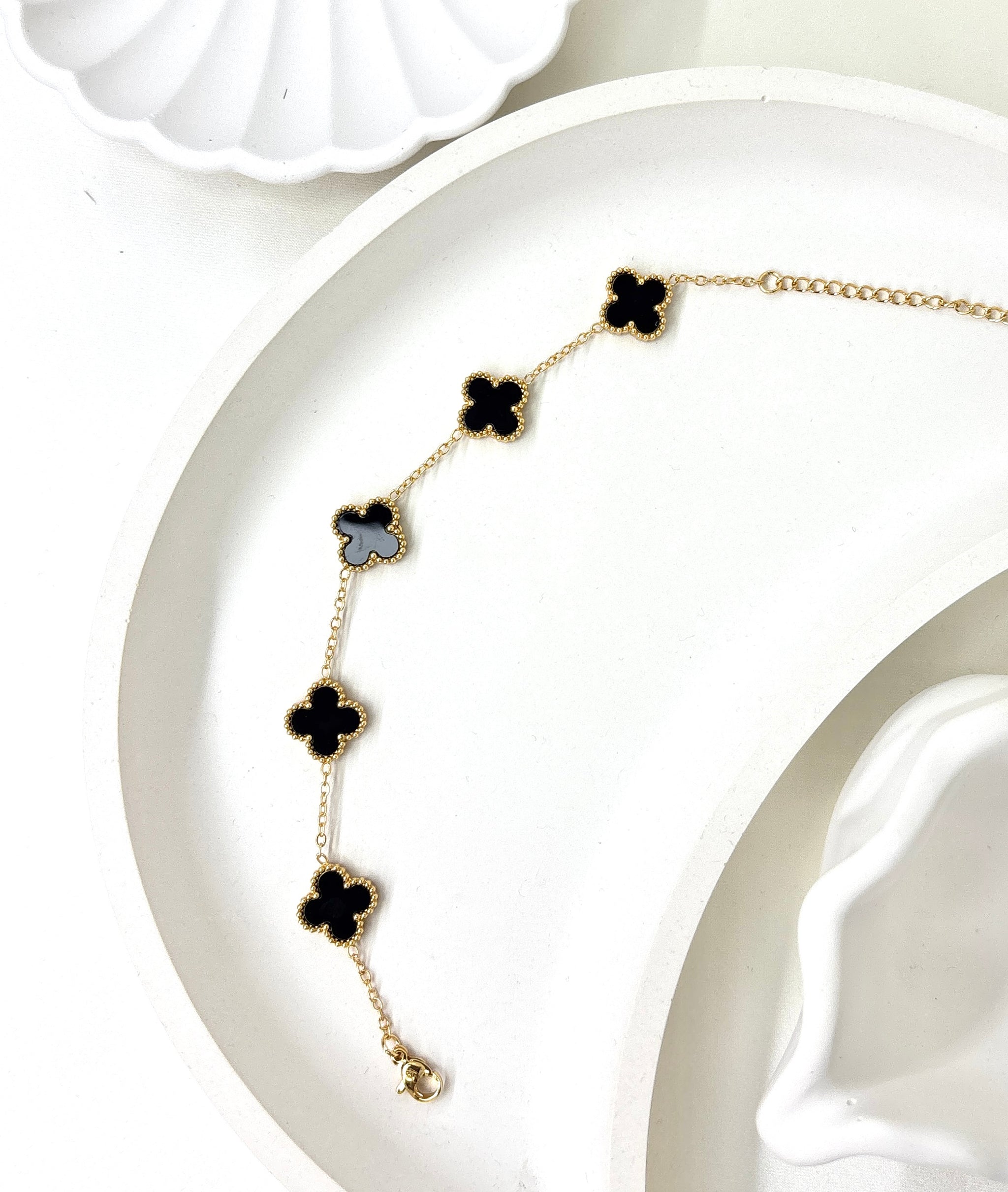 The Midnight Clover Charm