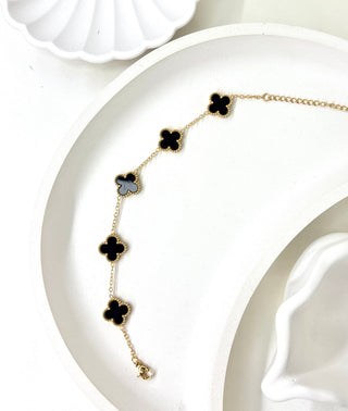 The Midnight Clover Charm