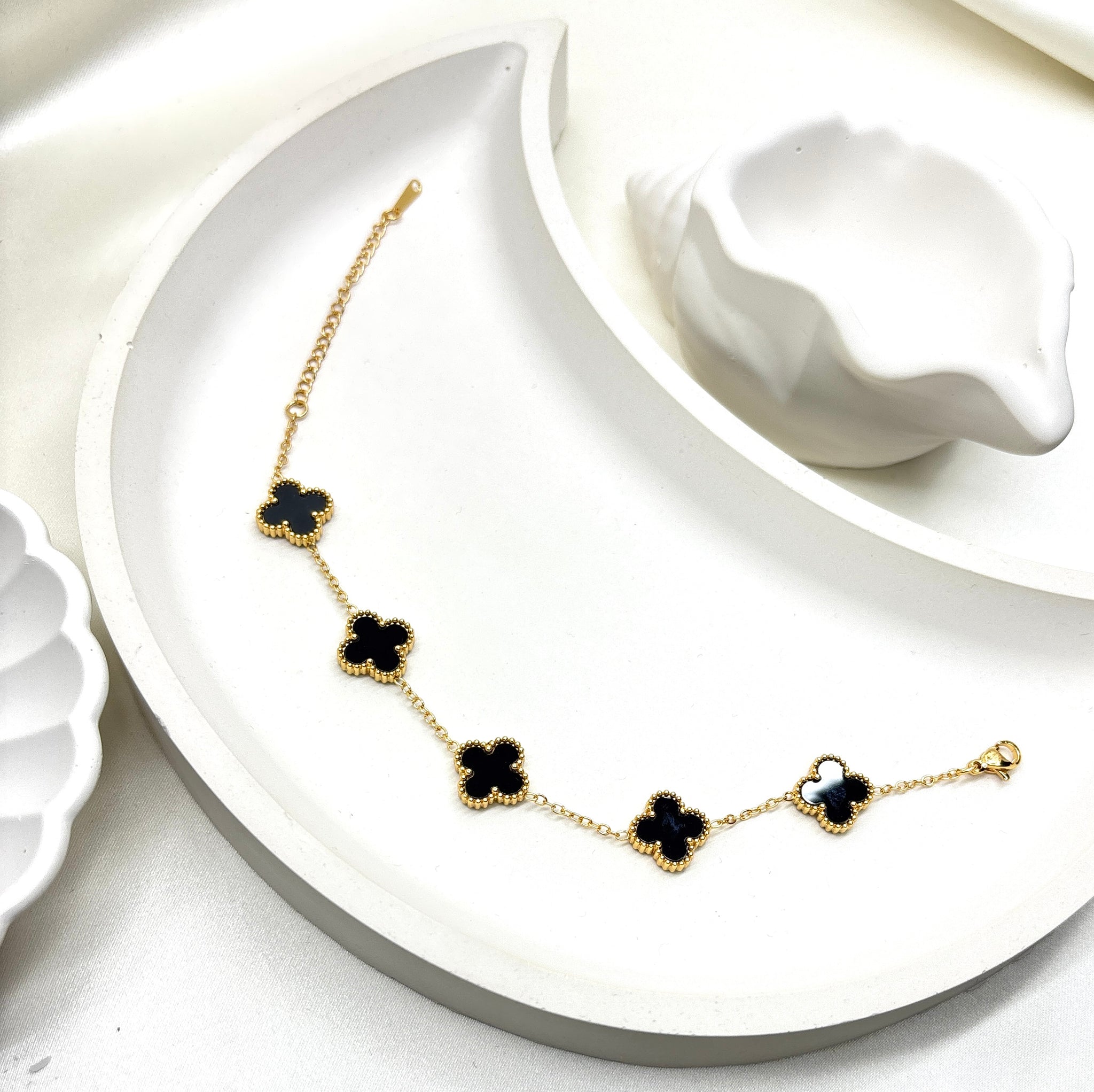 The Midnight Clover Charm