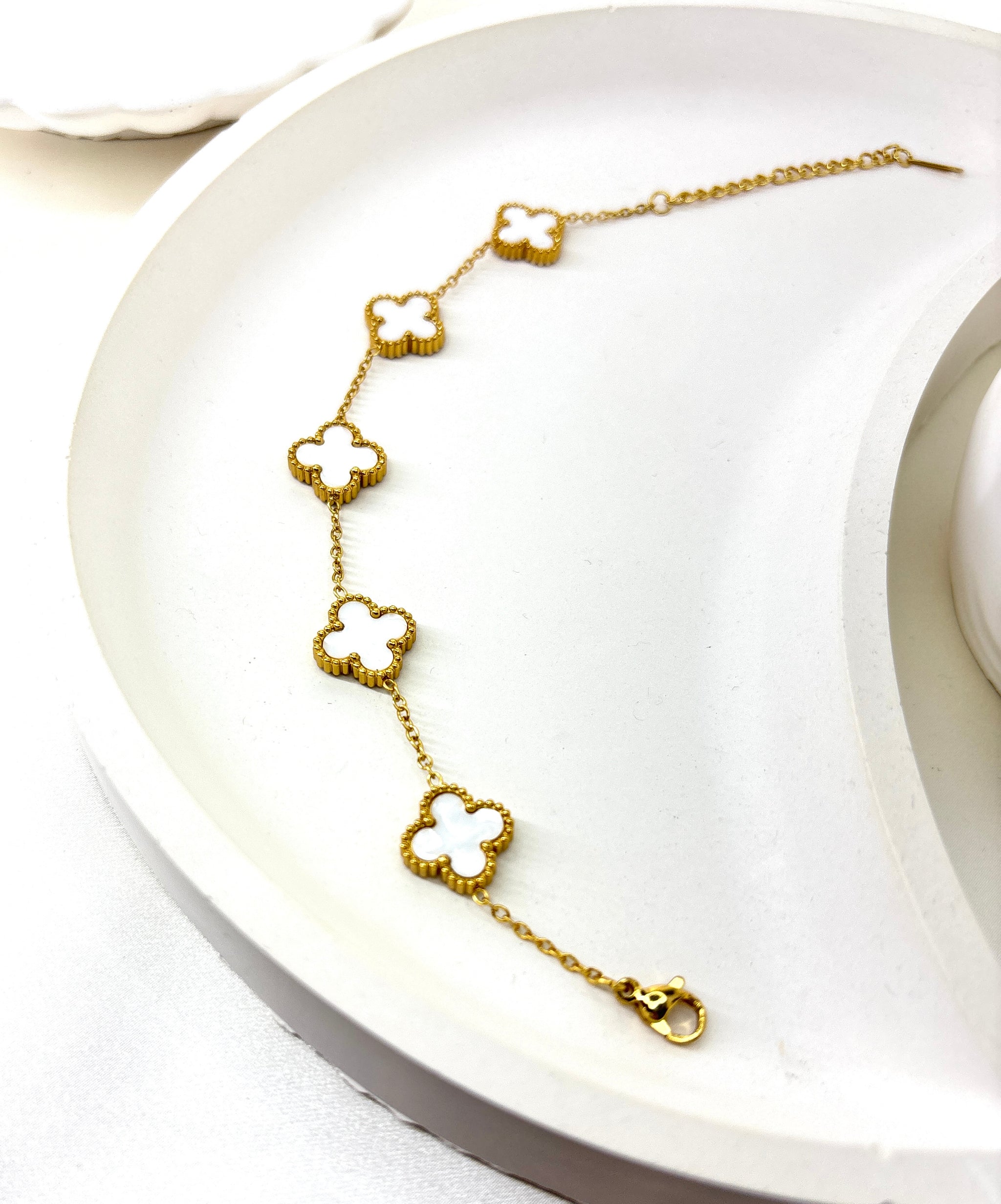 The Ivory Clover Charm