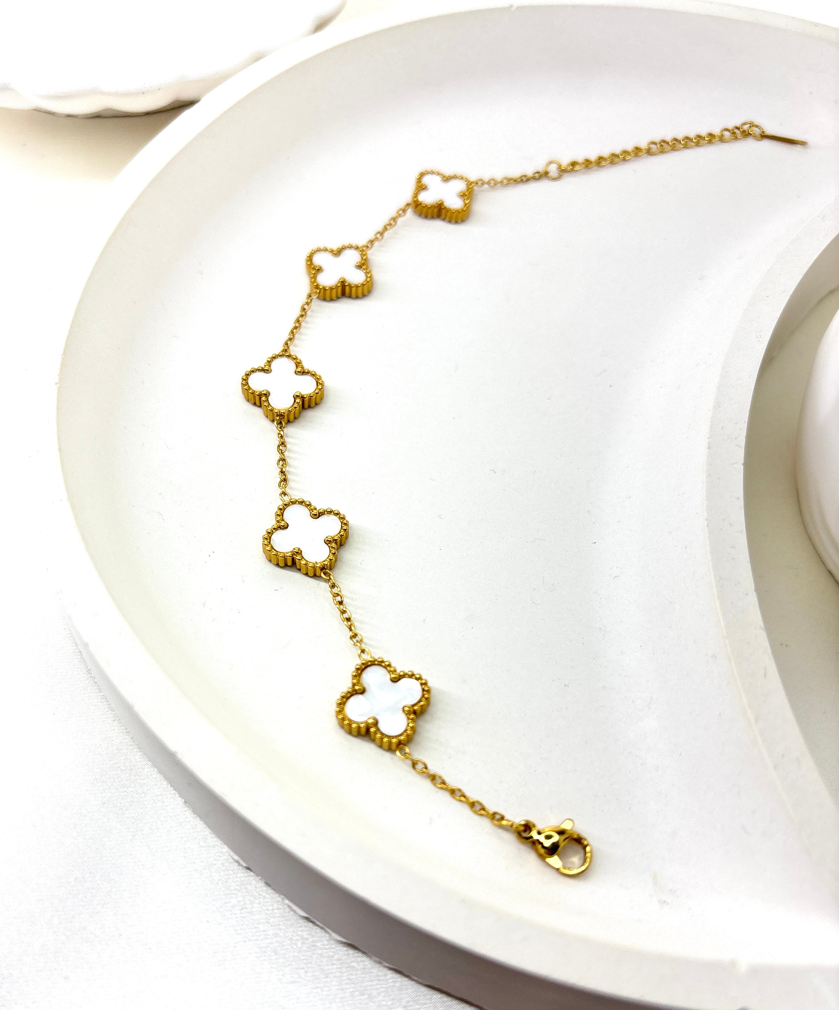 The Ivory Clover Charm