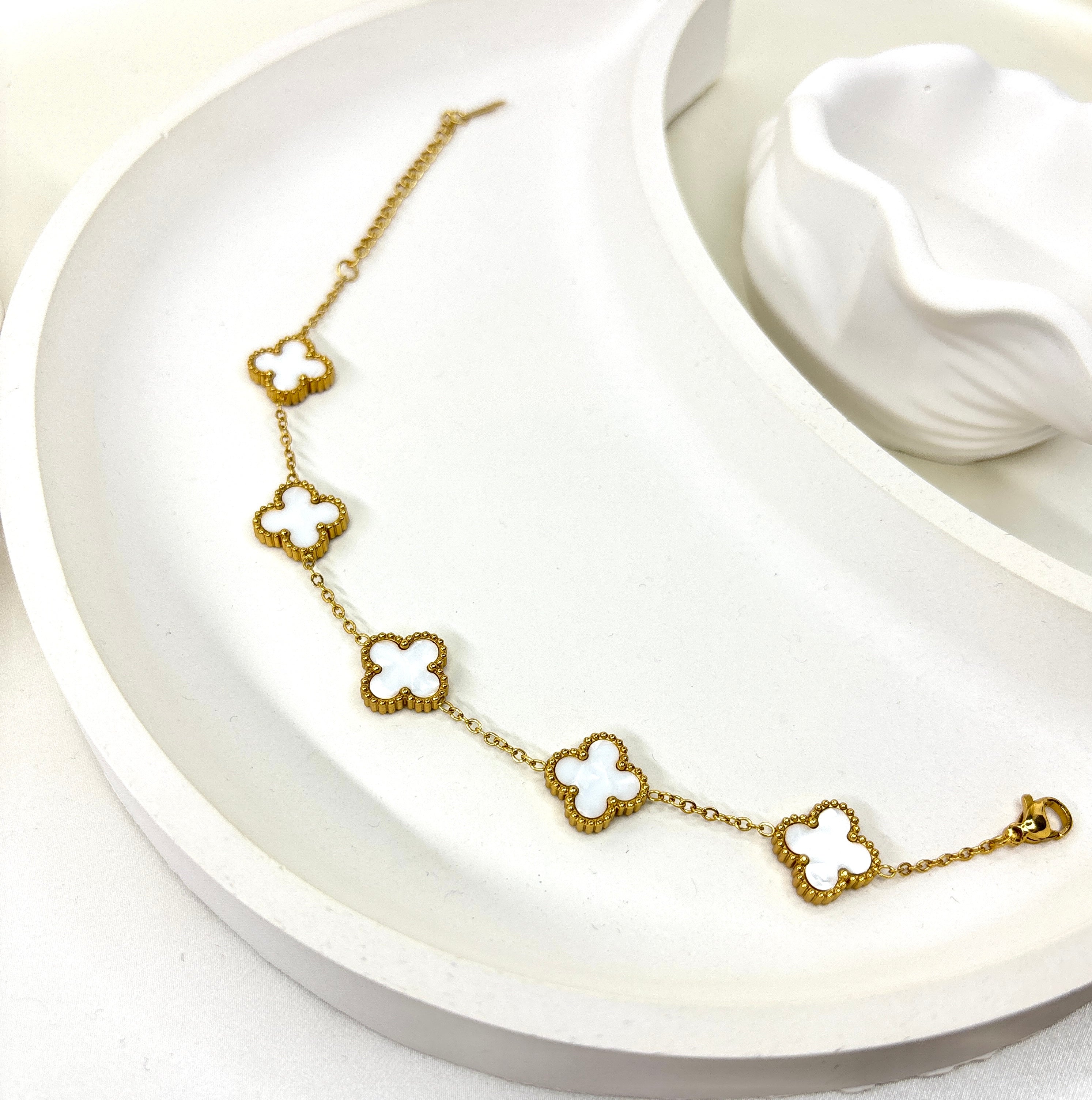 The Ivory Clover Charm