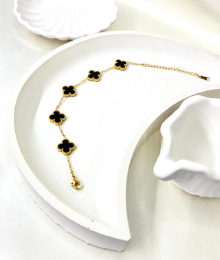 The Midnight Clover Charm